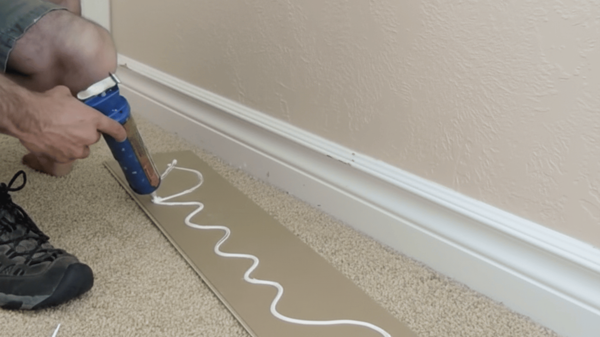 apply adhesive and install panels